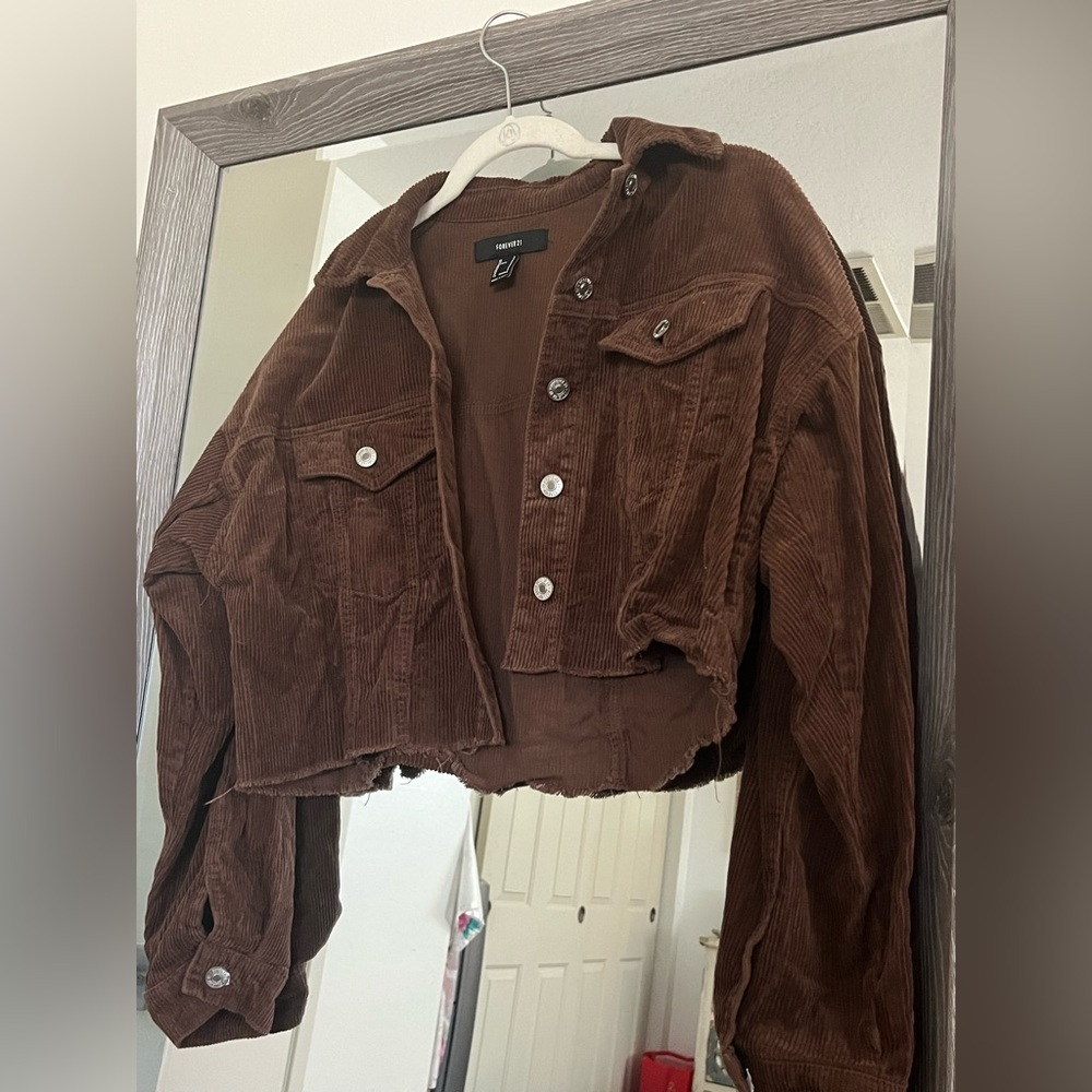 Brown corduroy cropped jacket. Gently used and good thick material with buttons.